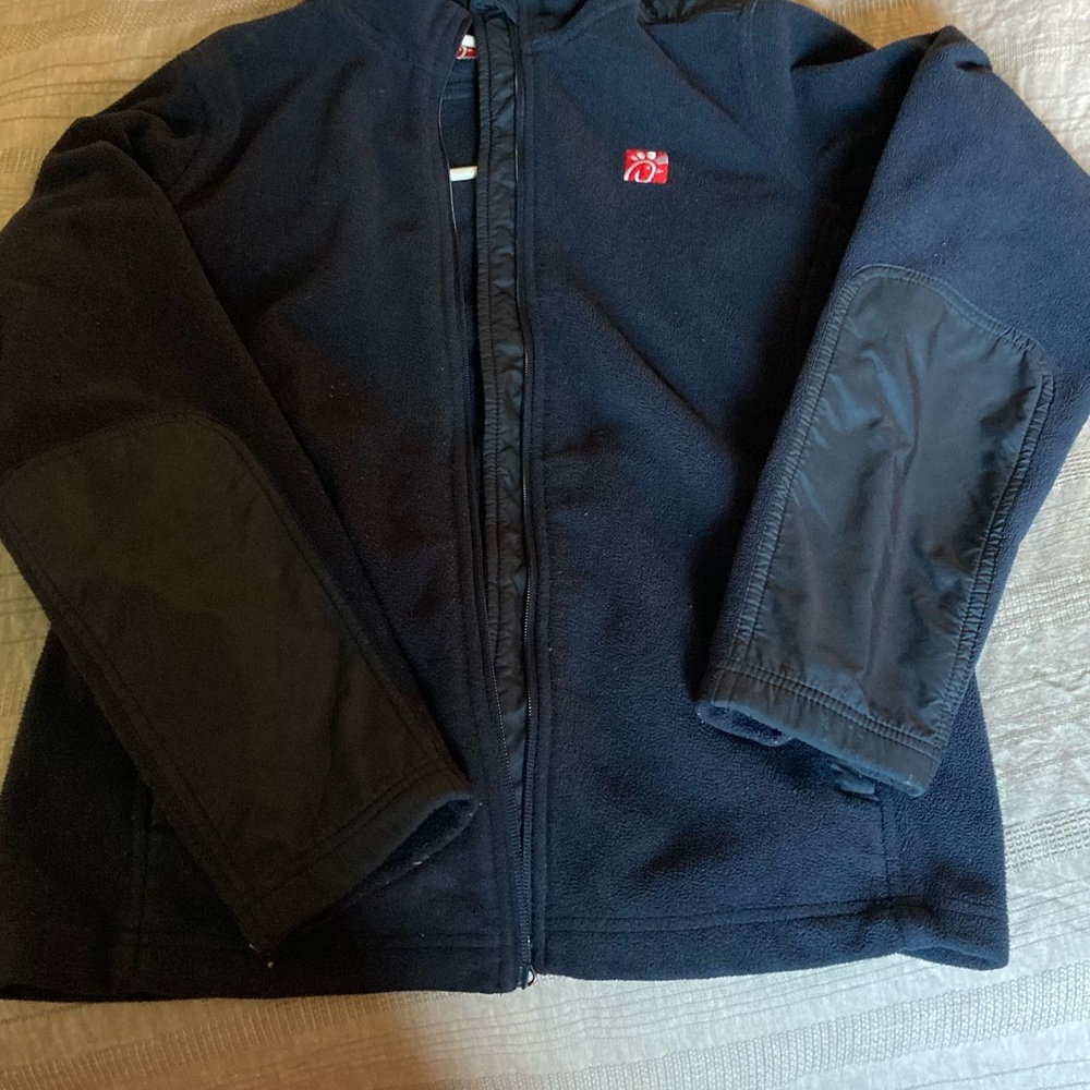 Chic-Fil-A CFA team member fleece winter jacket.  Navy trimmed in red
